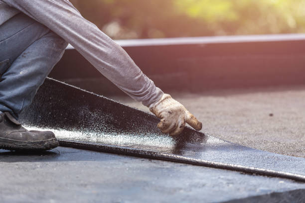 Professional Waterproofing technician working in Glen Ellyn, IL
